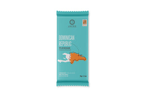 A teal wrapper, designed with an illustrated map of the Dominican Republic in orange. An arrow points to a location on the Eastern coast, where this origin farm is located.